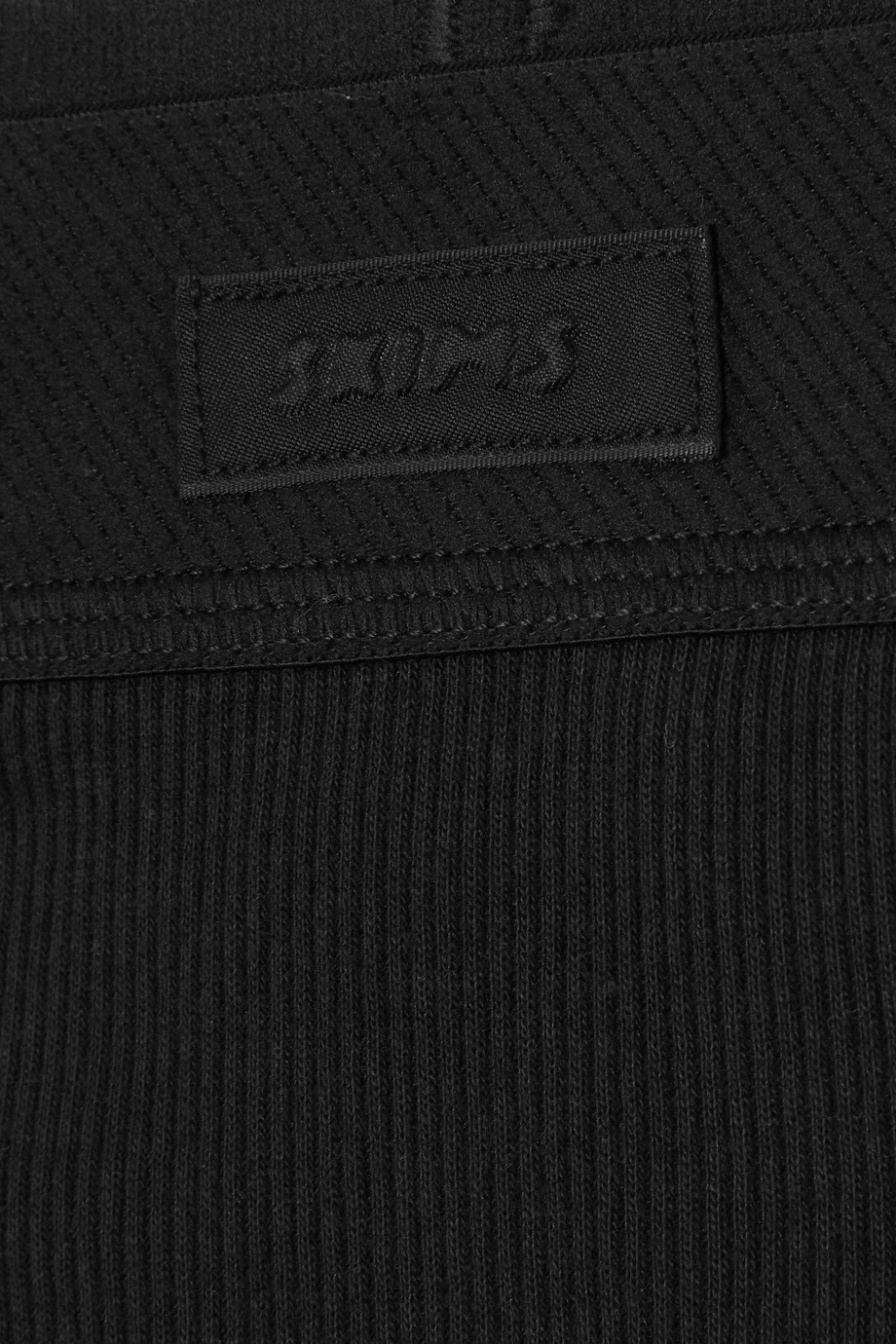 SKIMS Cotton Rib Thong – Soot – String Aus Geripptem Jersey Aus Einer Baumwollmischung ,Schwarz 4 SKIMS Cotton Rib Thong – Soot – String Aus Geripptem Jersey Aus Einer Baumwollmischung ,Schwarz – Bild 4